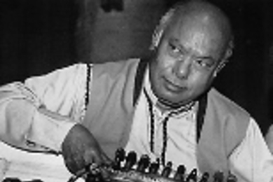 Ali Akbar Khan plays the sarod at a recent performance.