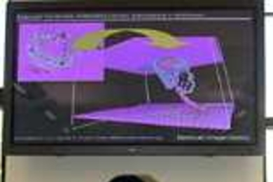 Ting Zhu (left), Ju Li, and Krystyn Van Vliet stand below an image in MIT's NanoMechanical Technology Lab that is akin to one they included in their paper on predicting defects in materials.