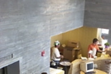 The first residents of Simmons Hall move in with boxes of belongings in late August.