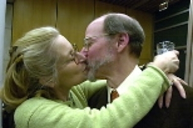 Professor Robert  Horvitz, winner of the Nobel prize in medicine, gets a kiss from wife Martha Constantine-Paton, who is also a professor of biology at MIT.