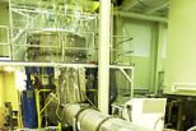 David Shoemaker, director of the LIGO Laboratory at the Center for Space Research, poses in the lab.