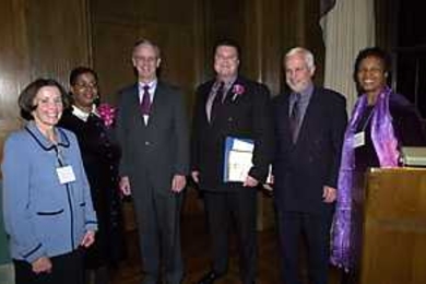 At the President's Community Service Award ceremony last week were (left to right) Rebecca Vest, award winner Kathy Reddick, President Charles M. Vest, award winner Michael Foley, Paul Parravano (co-director of the Office of Government and Community Relations), and Cambridge        City Councillor Denise Simmons.