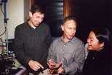 Postdoctoral associate Joerg Lahann (left), Professor Robert Langer and graduate student Thanh-Nga Tran, created a way to reversibly switch a surface's reponse to water.