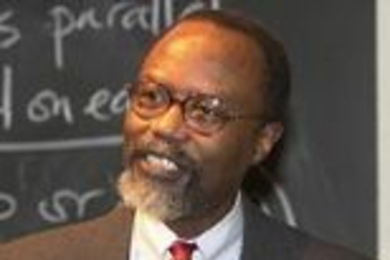 Chancellor Phillip Clay speaks at the first of three community meetings held in 10-250.