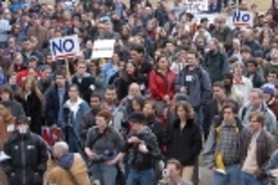 The crowd listens intently at Thursday's anti-war rally