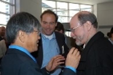 Chatting during a break at the Picower-RIKEN Neuroscience Symposium are (left to right) Susumu Tonegawa, a Nobel laureate and director of the Center for Learning and Memory; Professor Mark Bear, who just joined the Picower Center and the brain and cognitive sciences faculty; and 2002 Nobelist H. Robert Horvitz.