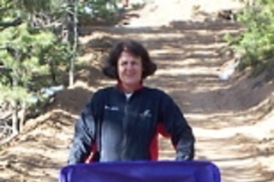 MIT administrator Andrea Hatch pushes her grandchildren, 14-month-old twins Wesley and Adabelle Wright, during a marathon training session in Colorado Springs.