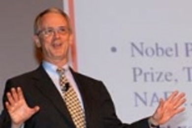 President Charles M. Vest refers to the quality of MIT's faculty during a town meeting held at Kresge Auditorium to discuss "Working Towards MIT's Mission in an Era of Constraints."