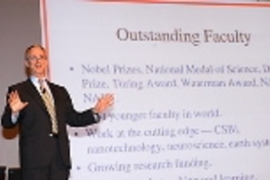 President Vest's pride is obvious as he discusses faculty accomplishments at the town meeting in Kresge Auditorium.