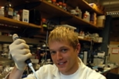 Senior Geoffrey von Maltzahn wields a micropipette in the Biotechnology Process Engineering Center where he did research on microscopic "carriers" that deliver molecules to specific cells.