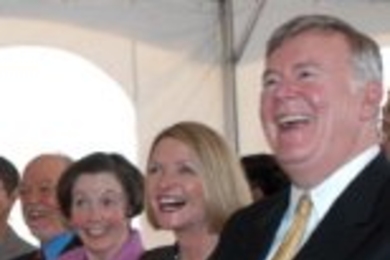 Enjoying the festivities at the groundbreaking for the McGovern Institute for Brain Research are (from left) Professor Phillip A. Sharp, director of the McGovern Institute; Rebecca Vest; Lore Harp McGovern; and Patrick J. McGovern Jr.