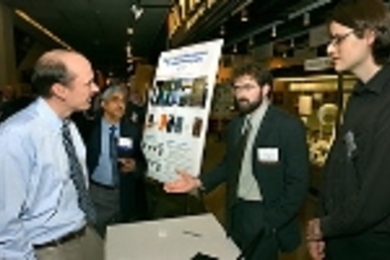 Eric Swanson of Sycamore Networks (left) and Mahendra Jain talk to Deshpande grant recipients Assistant Professor Fredo Durand (second from right) and visiting student Elmar Eisemann of the Laboratory for Computer Science at the Deshpande Center for Technological Innovation's first IdeaStream Symposium. The center was founded by Desh Deshpande, co-founder and chair of Sycamore Networks.