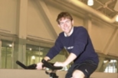 Kyle Rattray trains in the gym for his cross-country bike trek to raise money for cancer research.