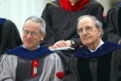 MIT President Charles M. Vest and former U.S. Sen. George Mitchell enjoy the scene on Killian Court before addressing the Class of 2003 and guests.