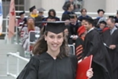 Christine Bataille struts off the platform after collecting her M.B.A.