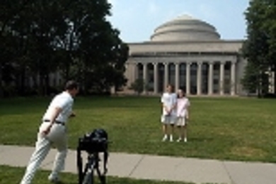 MIT alumnus John Wilkens (Ph.D. 1977) runs to join a self-timer snapshot of himself with his wife, Lucie Wilkens (Ph.D. 1977) and their son, 18-year-old freshman Chris Wilkens.