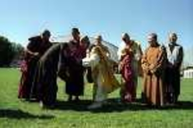 Buddhist monks gather outside Kresge Auditorium.