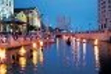 The "WaterFire" installation in downtown Providence, R.I., uses 100 bonfires in braziers set up on three rivers.
