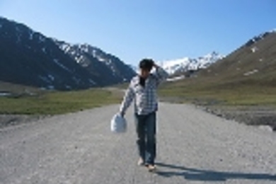 Michael Joo in a still from his piece "Circannual Rhythm (pibloktok)," a set of three synchronized DVD projections.