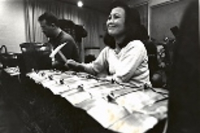 Balinese composer Desak Made Suarti Laksmi performs with a gamelan orchestra.