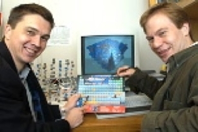 MIT Professor Gerbrand Ceder (left) and research associate Dane Morgan, both of the Department of Materials Science and Engineering, mine for materials with computers.