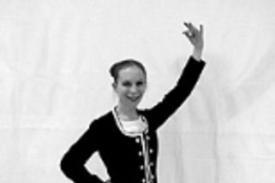 Jen Schoonover strikes a pose in her Scottish clothes.