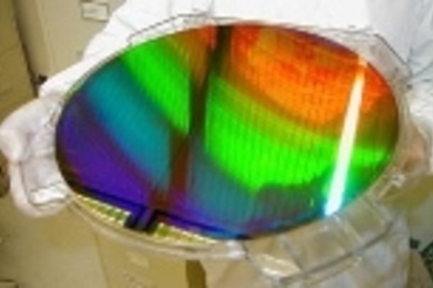 MIT's Nanoruler was used to create parallel lines and spaces only 400 billionths of a meter apart (the diameter of a human hair is about 250 times larger) across this silicon wafer. The wafer is 12 inches in diameter.