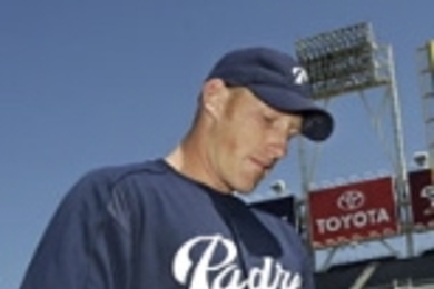 San Diego Padres pitcher and MIT alumnus Jason Szuminski signs  an autograph prior to the Padres' final exhibition  game Sunday, April 4.