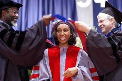 Ebonya Washington, center, is hooded by MIT Chancellor Phillip Clay, left, and Professor Bengt  Holmstrom, department head in the School of Humanities, Arts and Social Sciences. Washington earned her Ph.D. in economics. <a onclick="MM_openBrWindow('comm-main2-enlarged.html','','width=509, height=583')">
<span onmouseover="this.className='cursorChange';">Open image gallery</span>
</a>
<noscript> <a...