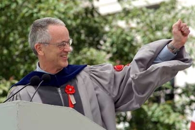 Charles Vest gestures in appreciation to a previous speaker before giving his charge to the graduates at his last Commencement as president of MIT.