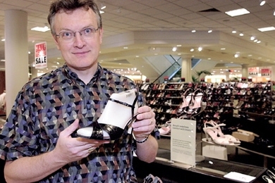 Alumnus Brian Hughes, chairman of Insolia shoe company, explains the engineering used in his product to make high heel shoes more comfortable.