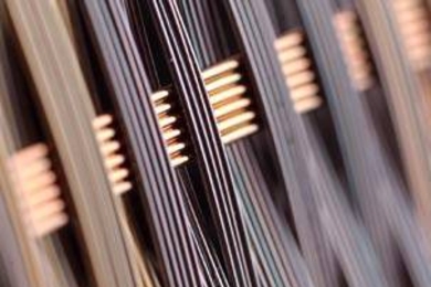 The above image is a close-up photo of a spectrometric fabric. Each fiber has a built-in photodetecting element and is sensitive to a different wavelength.