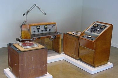 WTBS Radio Station: Console, turntables, reel-to-reel tape and station wall clock.
