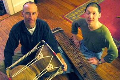 Percussionist Curt Newton (left) and cellist Jeff Song use the chang-go and kayagum, traditional Korean instruments, to create 'music inspired by and drawing upon a huge range of influences.' They will perform on campus on Friday, March 18.