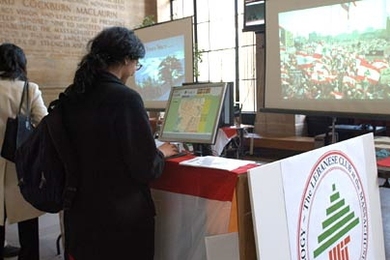 Passers-by explore exhibits on Lebanon in Lobby 10 last week. The Lebanese Club of MIT shared books, video footage and food on April 13-14 as part of Lebanese Awareness Week, which coincided this year with the 30th anniversary of the start of the Lebanese War.