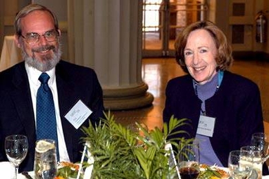 W. Eric Grimson, left, asssociate department head in electrical engineering and computer science, shares a moment with President Susan Hockfield at the Quarter Century Club induction lunch, held at Walker Memorial on Monday, April 11.
