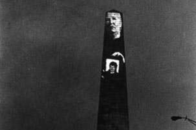 Known for such provocative works as this 1998 video projection onto Bunker Hill Monument, Professor Krzysztof Wodiczko will be on the panel of Wednesday's 'Art and Technology' symposium.