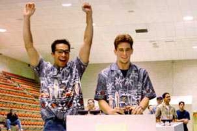 Dean Ljubicic, right, scores the winning shot in the 2004 contest, 'The Big Dig.' Co-driver Salvatore Pallante, left, leads a victory cheer.