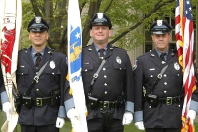 Officers, from left, Robert Molino, Kevin O'Connor and William Smith represent the MIT Campus Police Honor Guard at President Hockfield's inauguration. The honor guard will be leading the Commencement procession on Friday.