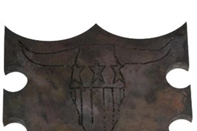 Second prize winner Andrew Brooks' 'Steer Roast Shield,' in stainless steel, is built to survive Senior Haus' roasting pit fire.