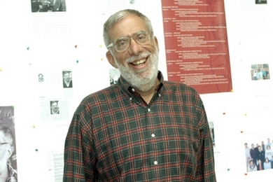 Dean of Science Robert J. Silbey poses in front of one of the bulletin boards that stood in the Stata Center on Friday, June 24, filled with his colleagues' reminiscences and good wishes.