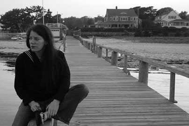 Janni Moselsky-Hansen, artist and administrative assistant in the architecture department, relaxes near her Hyannisport home.