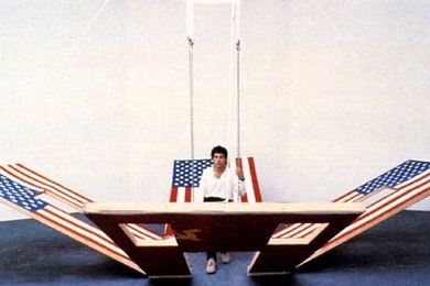 Vito Acconci's Instant House is a self-erecting architectural unit consisting of flags, wood, cables and pulleys. Acconci will speak at MIT next week.