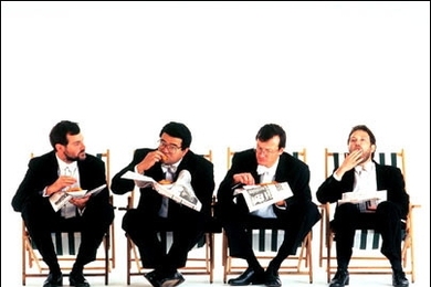 Members of the Endellion String Quartet enjoy fish and chips. They will perform a Mozart quintet at MIT this Friday with Professor Marcus Thompson.