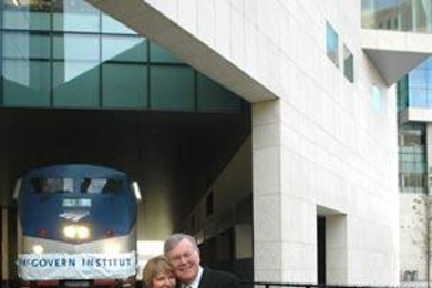 Lore Harp McGovern and Pat McGovern hug on the tracks that run under the brain and cognitive sciences complex, new home of the McGovern Institute for Brain Research at MIT. <a onclick="MM_openBrWindow('mcgovern-tracks-enlarged.html','','width=509, height=583')">
<span onmouseover="this.className='cursorChange';">Open image gallery</span>
</a>
<noscript> <a href="mcgovern-tracks-enlarged.html">
...