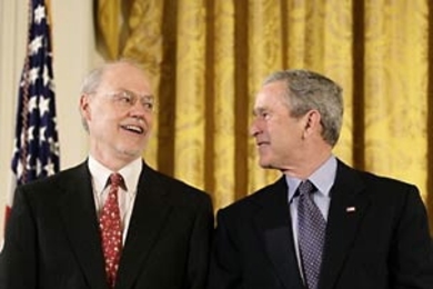 President George W. Bush congratulates MIT Institute Professor Phillip A. Sharp on receiving the National Medal of Science on Monday, Feb. 13, in the White House.