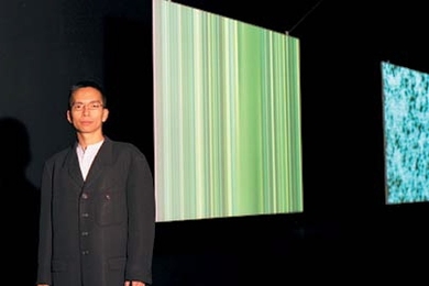 MIT Associate Professor John Maeda stands alongside stills from his 'Nature' series at the Fondation Cartier Pour l'Art Contemporain in Paris. <a onclick="MM_openBrWindow('maeda-portrait-enlarged.html','','width=509, height=583')">
<span onmouseover="this.className='cursorChange';">Open image gallery</span>
</a>
<noscript> <a href="maeda-portrait-enlarged.html">
<em>(no JavaScript)</em>
</a>
...