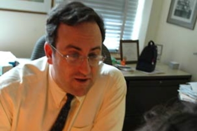 MIT Financial Aid Director Daniel Barkowitz lays out a few fool cards from different decks of tarot cards. Barkowitz teaches two courses during the Independent Activities Period -- one on financial aid and one on tarot.