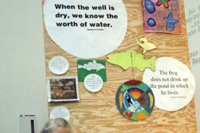 Artist-in-residence Cindy Snodgrass shows off some painted fish that are part of her temporary installation about water in the Stata Center. The exhibit is called 'S.O.S.-Fish.'