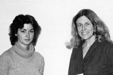 Founding President Barbara Johnston, left, holds the charter certificate for the MIT chapter of the Society of Women Engineers in February 1980. At right is Sheila E. Widnall, who is now an Institute professor.